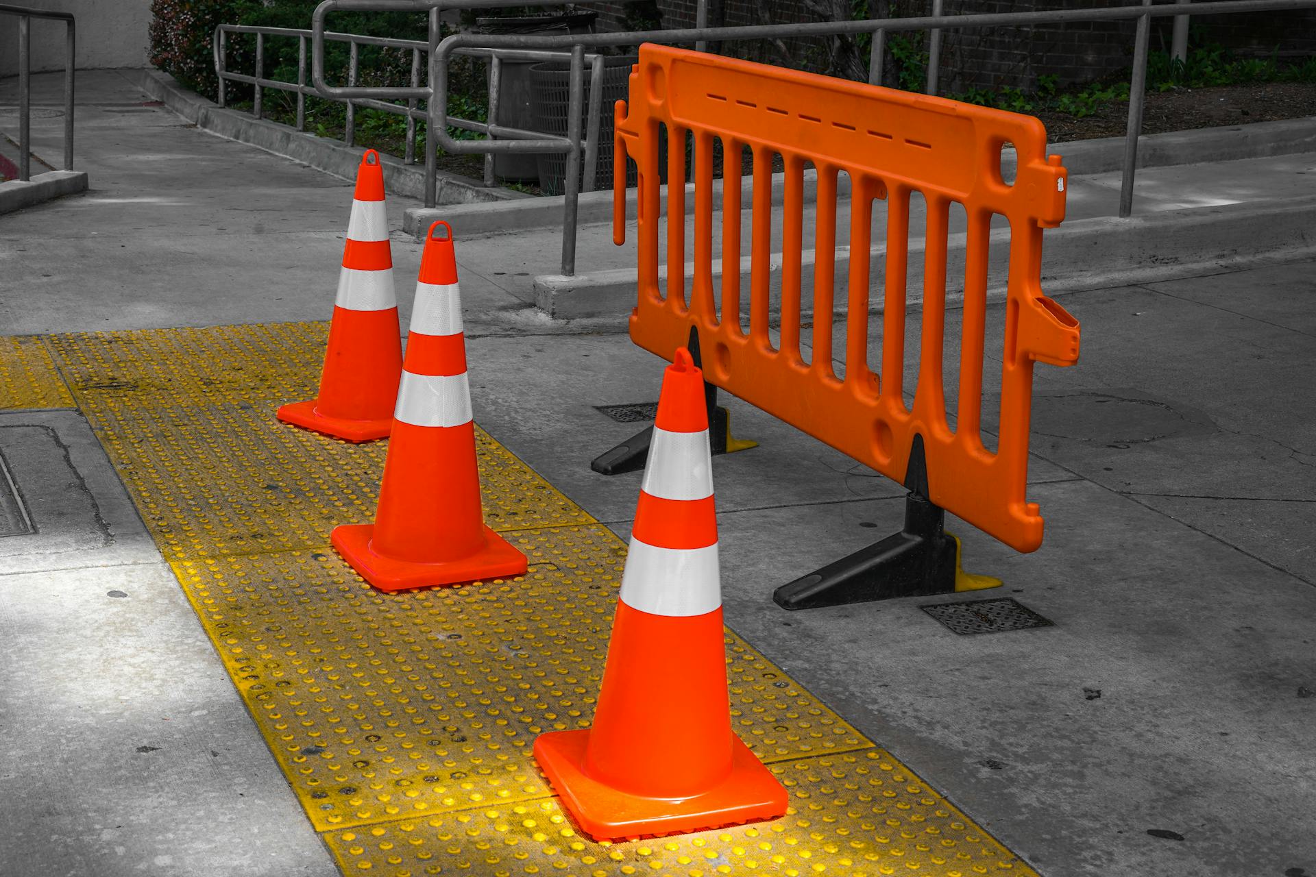 Road construction zone with traffic cones and barriers